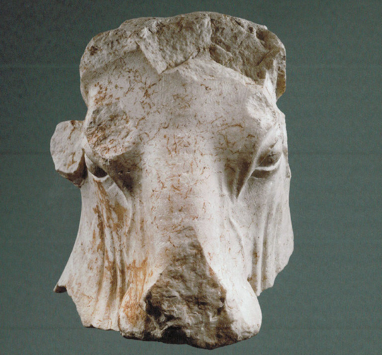 Ancient marble sculpture of a Bull's head